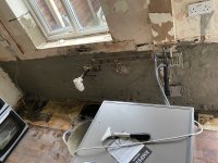 HELP! - plastering over slurry (mums kitchen) conflicting advice