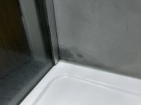 Microcement dark patches