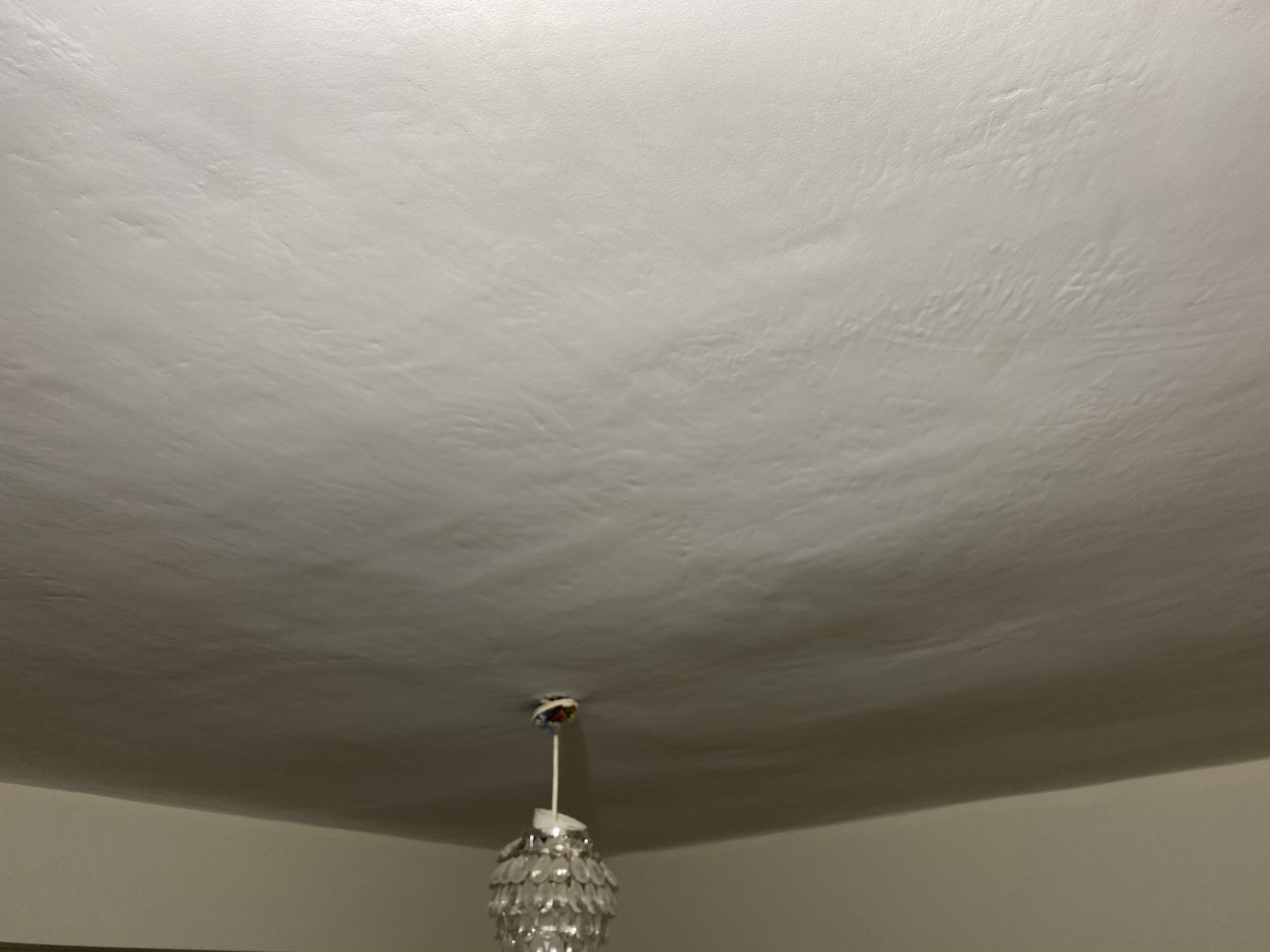 Advice needed please. Plastering on artex ceilings.