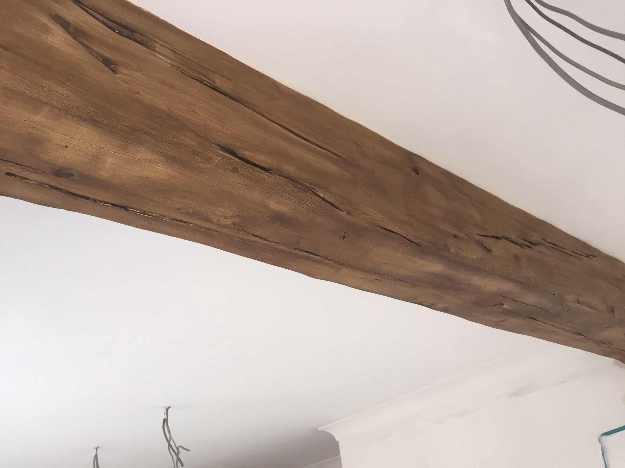 Plaster effect wooden beams