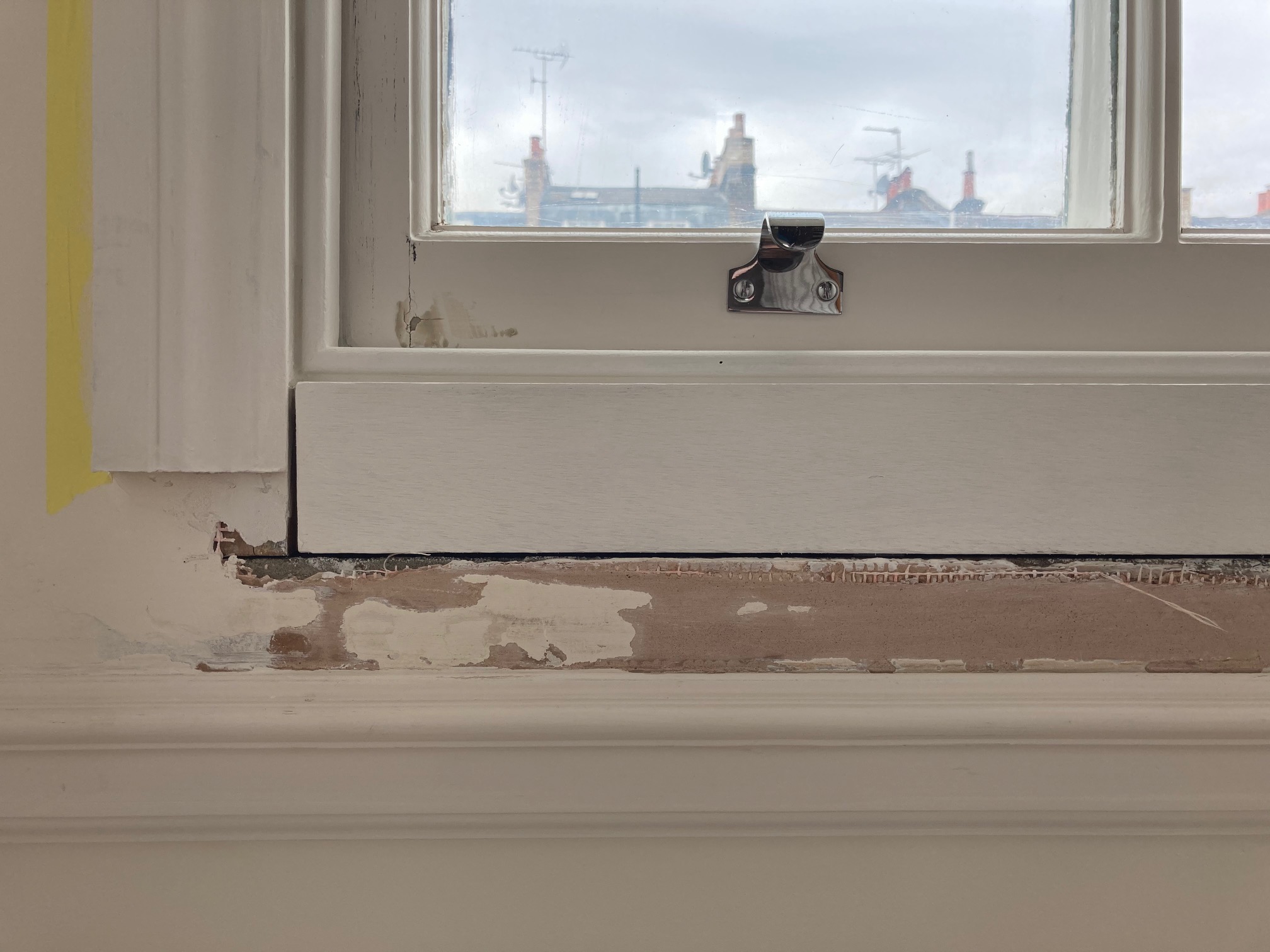 Window sill replacement and plaster repairs around window frame