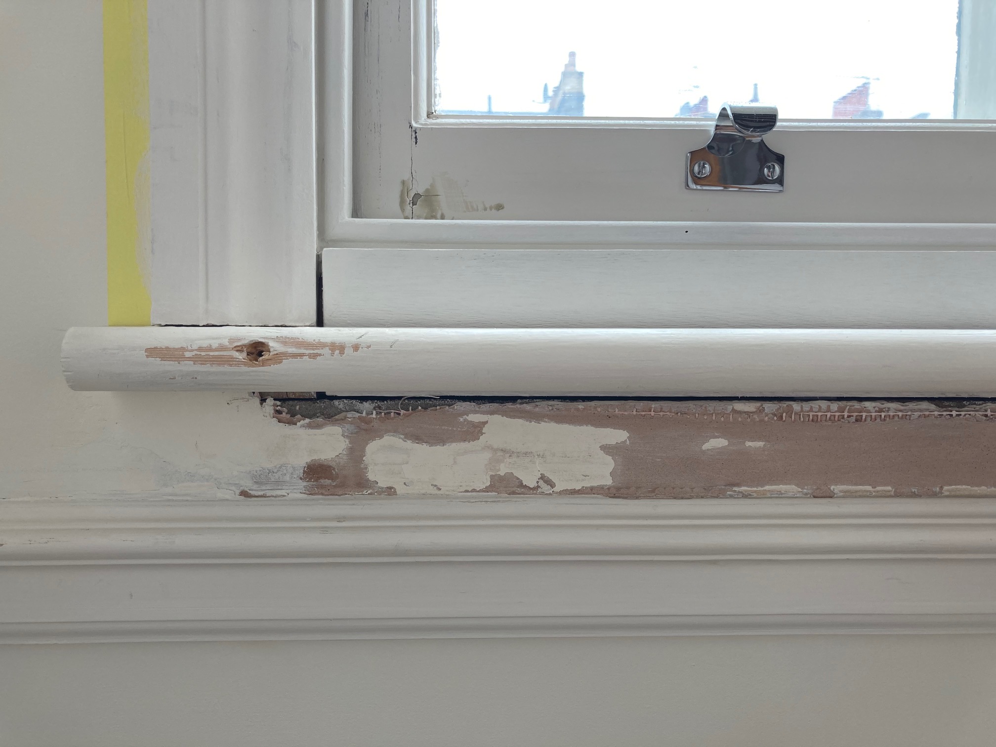 Window sill replacement and plaster repairs around window frame