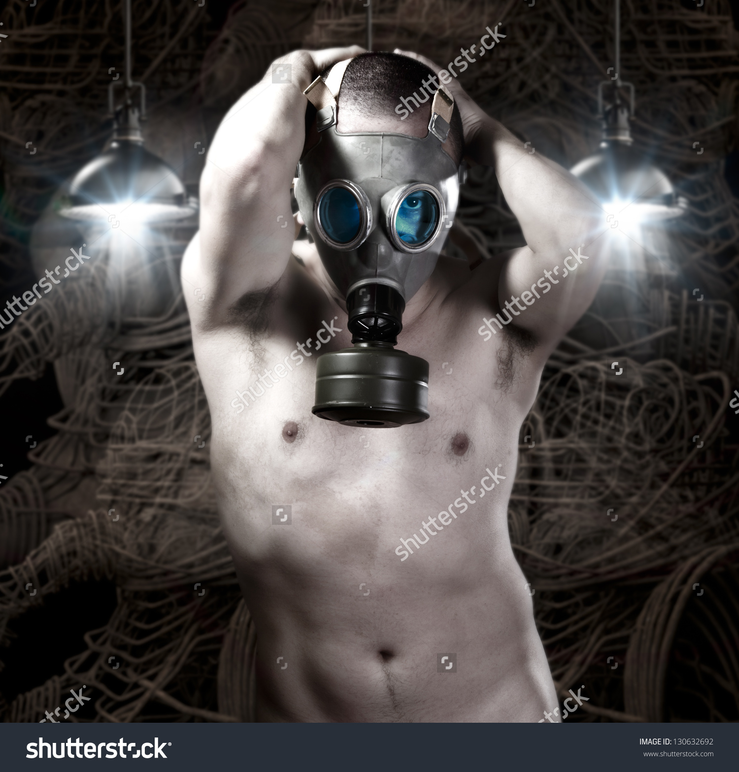 stock-photo-naked-man-with-gas-mask-on-background-of-robots-and-technology-130632692.jpg