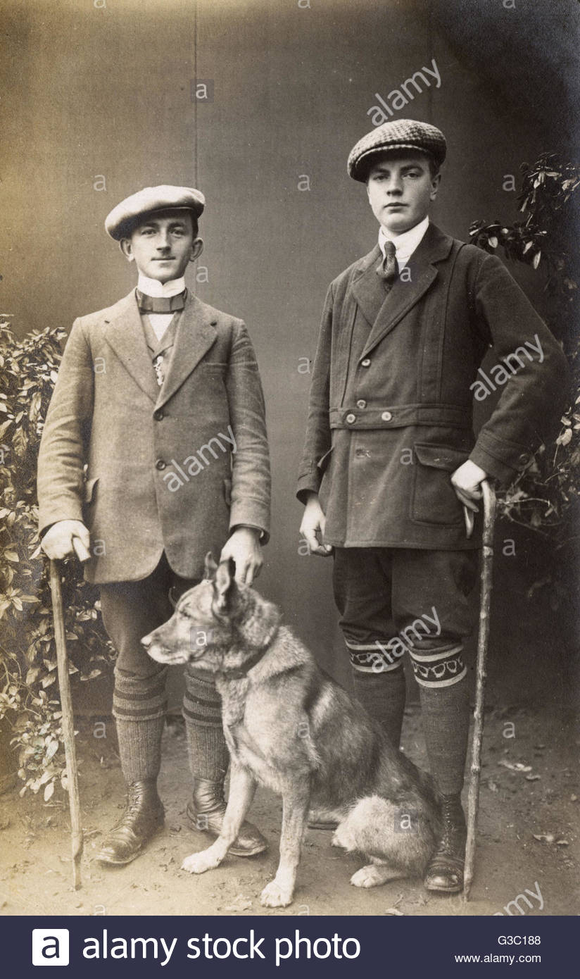 studio-portrait-two-men-with-walking-sticks-and-a-dog-germany-date-G3C188.jpg