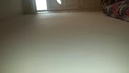 wavy lines and ripples in plastered wall