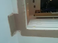 Repairing a water damaged dot and dabbed plasterboard wall. Repairing a water damaged dot and dabbed plasterboard wall.
