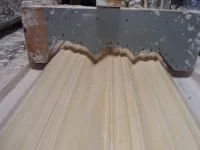 Running radius mouldings, expansion issue inner edge curling off the glass bench