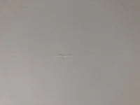 Bubble on joints of boards. Airless plaster