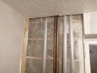 Seal behind dot and dab plasterboard