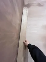 Straightening wall before tiling