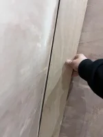 Straightening wall before tiling