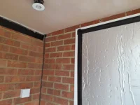 Plastered ceiling dips at one end