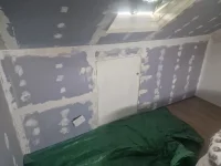Plastering over fresh plaster