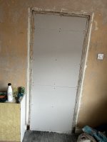 Blocking doorway with stud wall before plastering