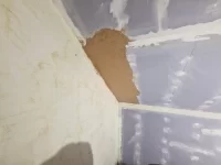 Plastering over fresh plaster