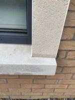 Silicone render damp after rain